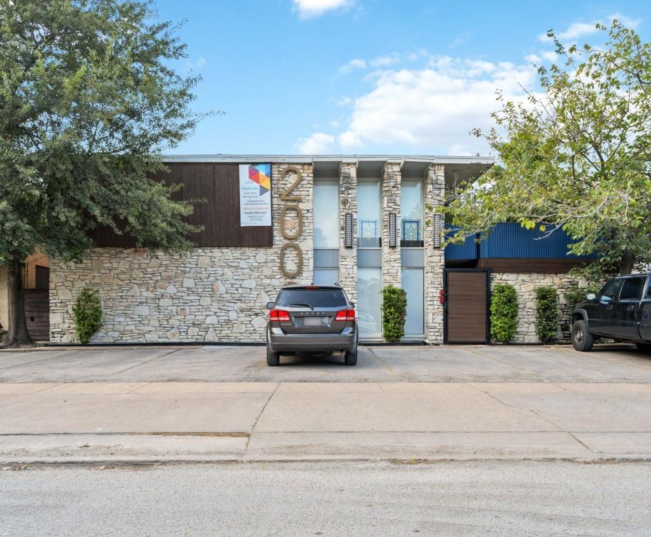 a car parked in front of a building